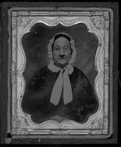 UnknownWomanCarpenterFamilyTintype.jpg